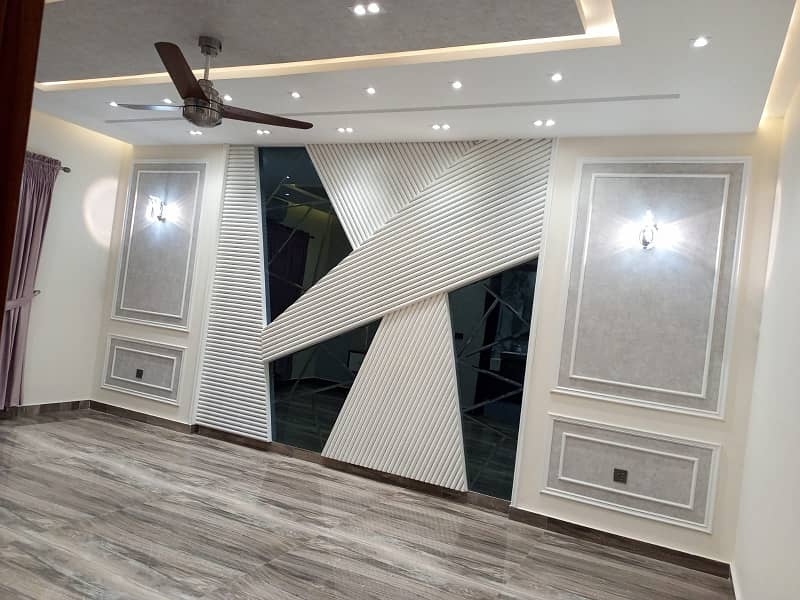 One Kanal Ultra Luxury Modern Double Height Lobby Semi Furnished House With Eight Inverter AC, Two Door Inverter Refrigerator And MWO Installed At Prime Location Of Jasmine Block Secter C Bahria Town Lahore 22