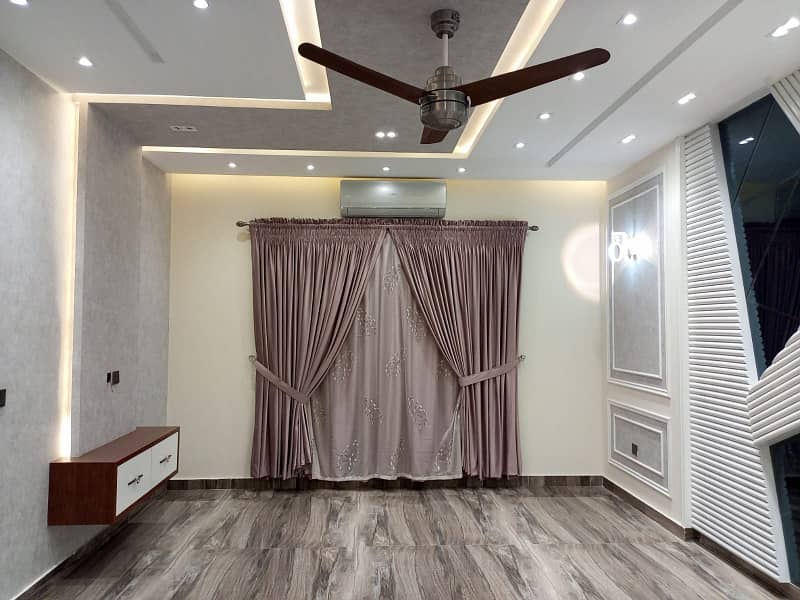 One Kanal Ultra Luxury Modern Double Height Lobby Semi Furnished House With Eight Inverter AC, Two Door Inverter Refrigerator And MWO Installed At Prime Location Of Jasmine Block Secter C Bahria Town Lahore 23