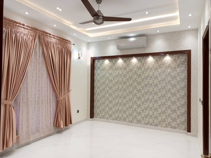 One Kanal Ultra Luxury Modern Double Height Lobby Semi Furnished House With Eight Inverter AC, Two Door Inverter Refrigerator And MWO Installed At Prime Location Of Jasmine Block Secter C Bahria Town Lahore 32