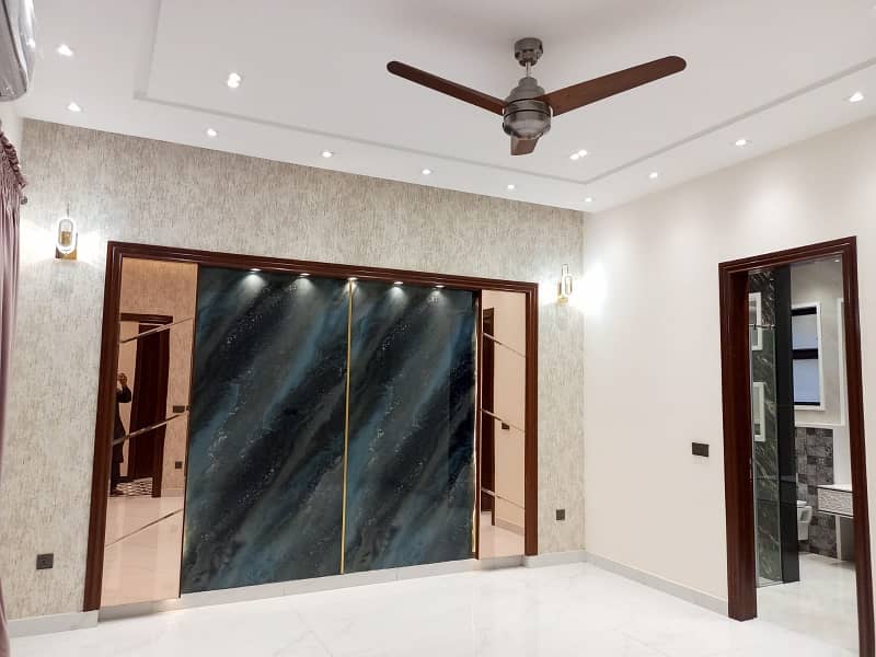 One Kanal Ultra Luxury Modern Double Height Lobby Semi Furnished House With Eight Inverter AC, Two Door Inverter Refrigerator And MWO Installed At Prime Location Of Jasmine Block Secter C Bahria Town Lahore 37