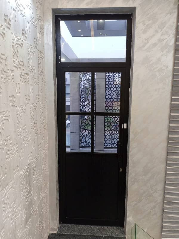 One Kanal Ultra Luxury Modern Double Height Lobby Semi Furnished House With Eight Inverter AC, Two Door Inverter Refrigerator And MWO Installed At Prime Location Of Jasmine Block Secter C Bahria Town Lahore 44