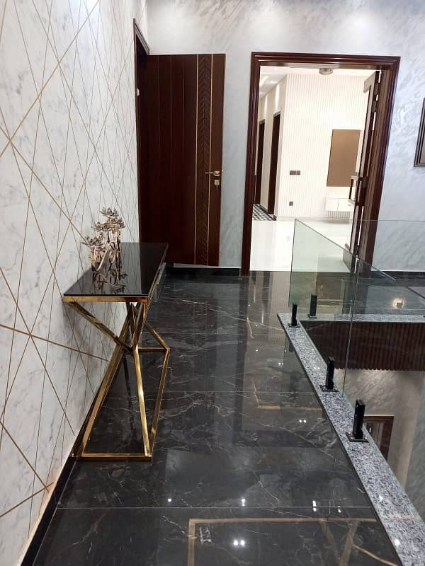 One Kanal Ultra Luxury Modern Double Height Lobby Semi Furnished House With Eight Inverter AC, Two Door Inverter Refrigerator And MWO Installed At Prime Location Of Jasmine Block Secter C Bahria Town Lahore 46