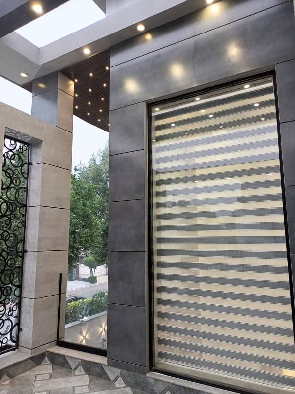 One Kanal Ultra Luxury Modern Double Height Lobby Semi Furnished House With Eight Inverter AC, Two Door Inverter Refrigerator And MWO Installed At Prime Location Of Jasmine Block Secter C Bahria Town Lahore 47