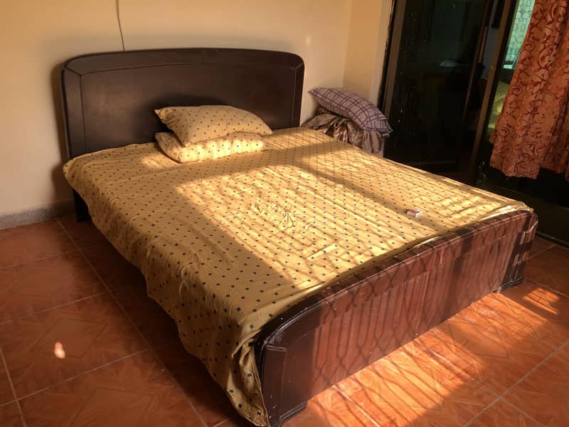 wooden King size Bed Available 0