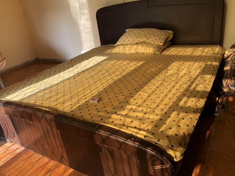 wooden King size Bed Available 1