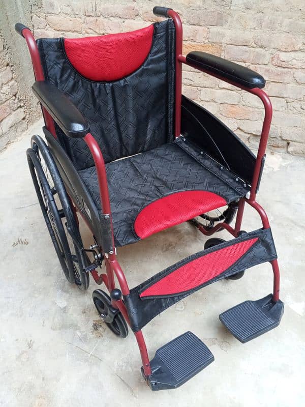 wheel chair new condition 0