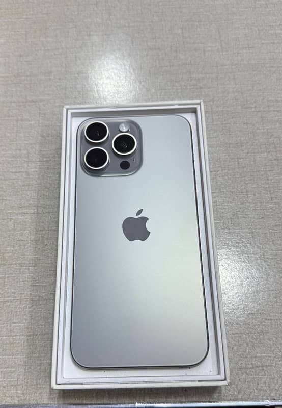 iPhone 15 pro max natural titanium pta 0