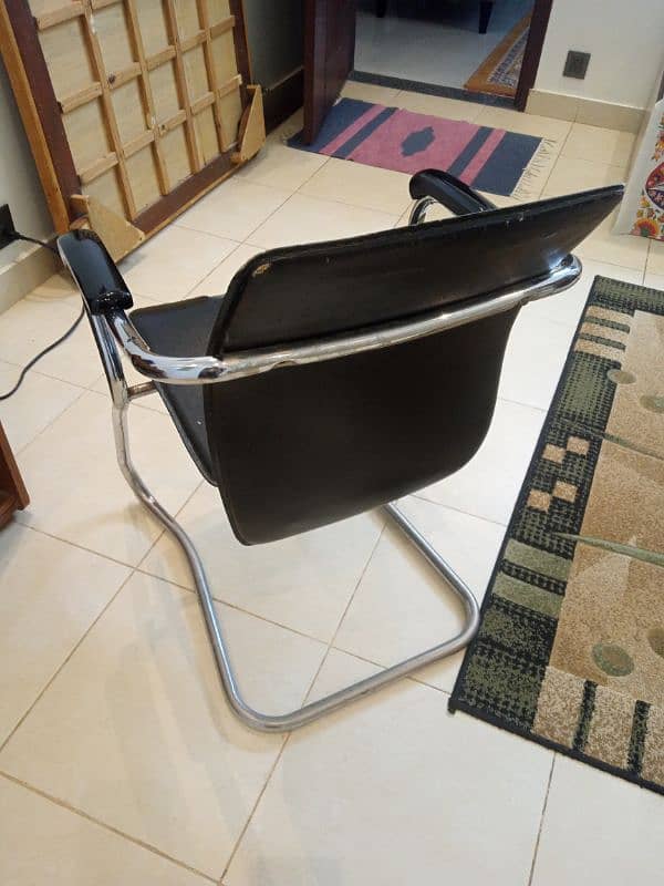 comfortable chair in good condition leather seat 0