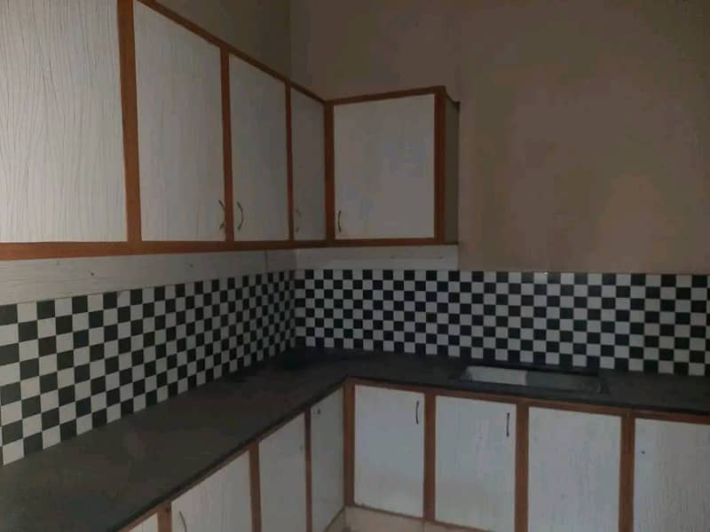 10 Marla Tile Upper portion is For rent in wapda town Block J2. 1