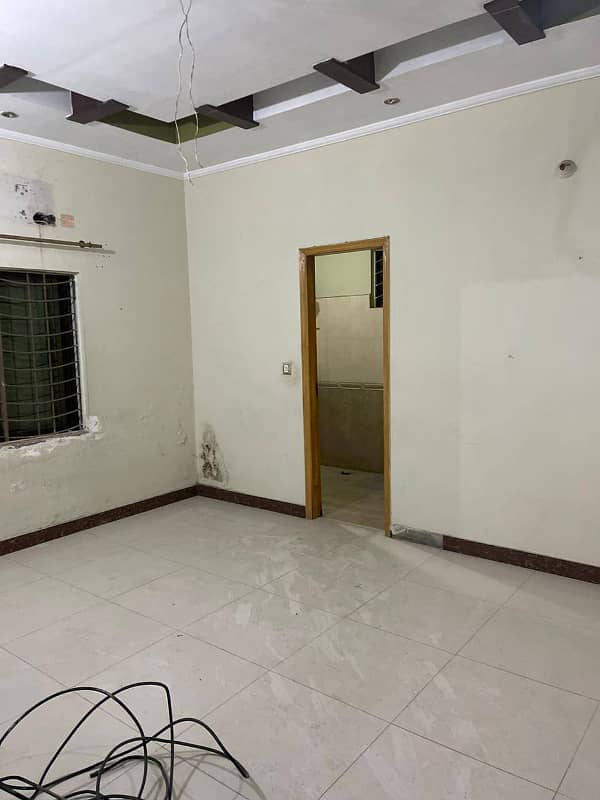 10 Marla Tile Upper portion is For rent in wapda town Block J2. 2