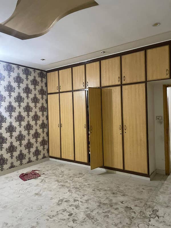 10 Marla Tile Upper portion is For rent in wapda town Block J2. 13