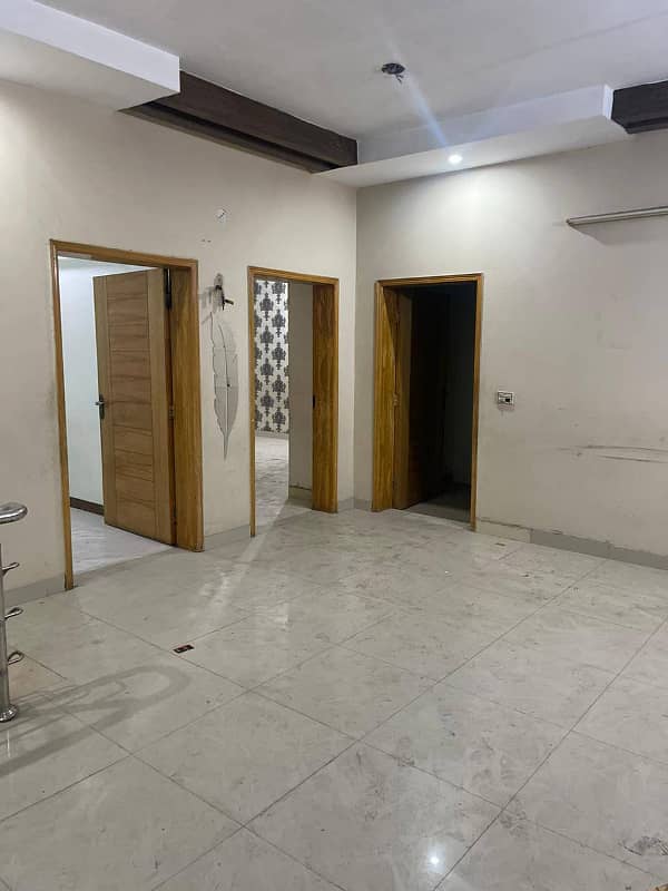 10 Marla Tile Upper portion is For rent in wapda town Block J2. 14