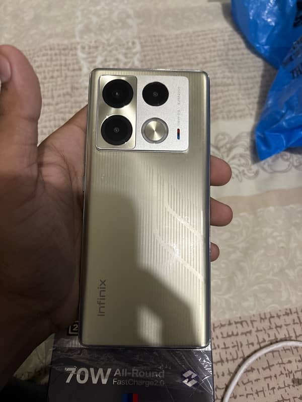 infinix note 40pro with wireless and 9 month warranty 4