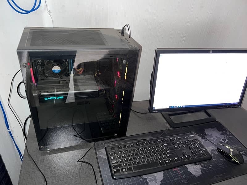 gaming pc with table and screen 6