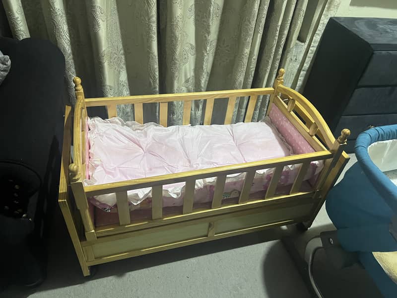 Wooden swing and baby cot 2