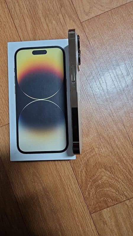 14pro golden 512gb 87%battery non active non Pta with box 10/10 3