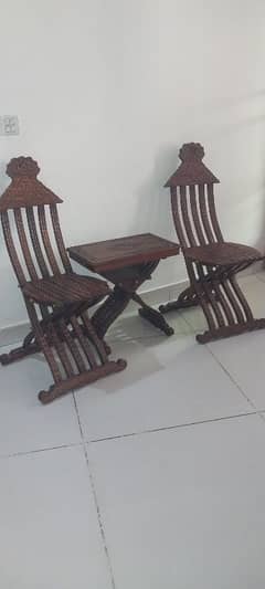 chinoti chairs with table