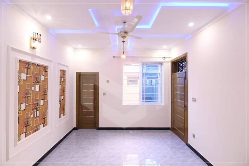 Prime Location Beautiful 6 Marla One and Half Story House for Sale in AECHS Airport Housing Society Near Gulzare Quid and Express Highway 4