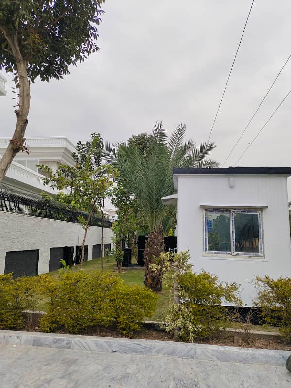 Beautiful kanal triple story full house available for rent in f-10 Islamabad at big street, 9 bedroom with bathrooms, drawing dining TVL car porch, near to park, near to markaz. 0