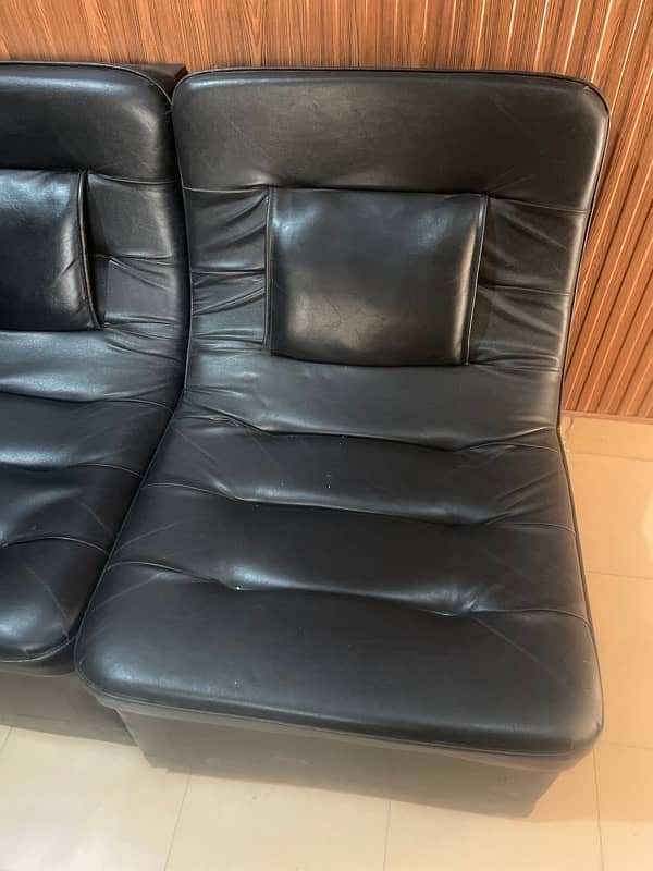 new condition 6 sofas , lush condition , black color , few days use 1