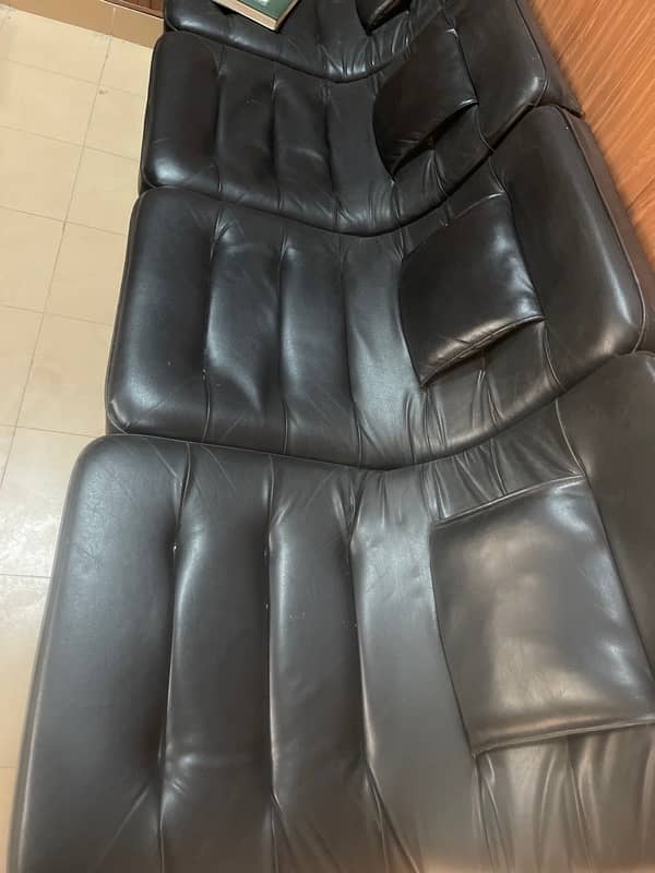 new condition 6 sofas , lush condition , black color , few days use 2