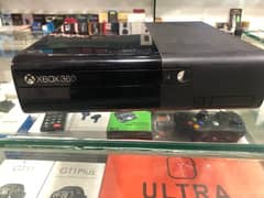 Xbox 360 E Slim with games