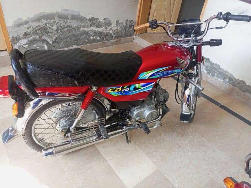 Honda CD70 2024 4