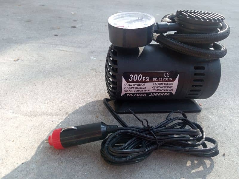 Air compressor for tyres of car, motorcycle, cycle and sports balls 3