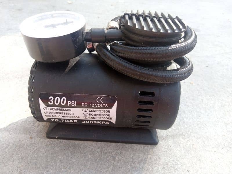 Air compressor for tyres of car, motorcycle, cycle and sports balls 4