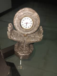 Antique decoration piece with clock