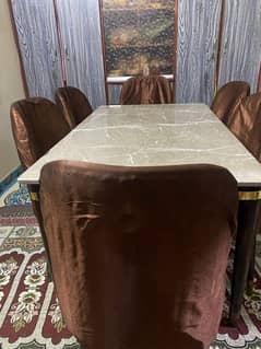 1 month use only 6 person dining table marble top with top covers