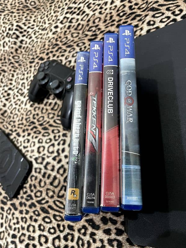 PS4 Slim 500GB With Two Controllers and Four Games 19