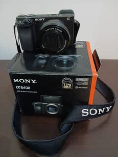 sony a6400 with 16-55 original lens box pack  Tripod new