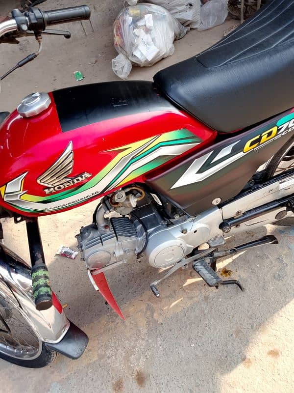 Honda CD 70cc Red 2023 condition 10/10  documents ok koi fault ni hy 7