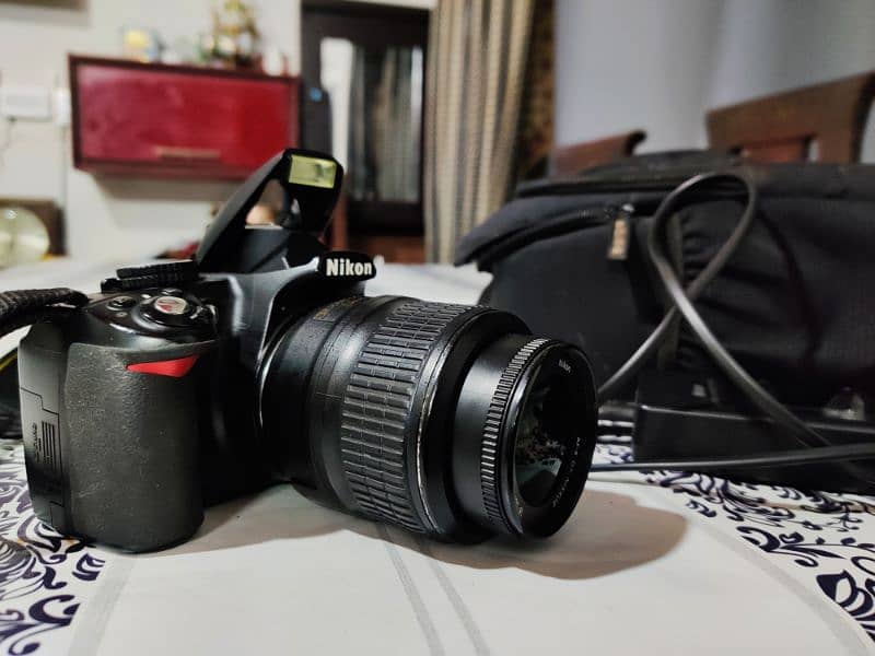 Nikon D3100 with 18-55mm Lens and kit 0