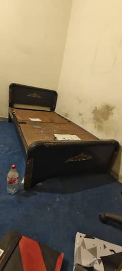 single wooden bed for urgent sale