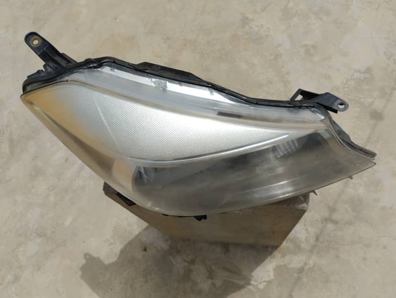 Vitz 2013 Headlight Left side (Driver side) 1