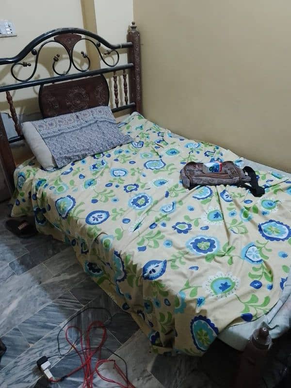 rod iron wooden style single bed for sale 0