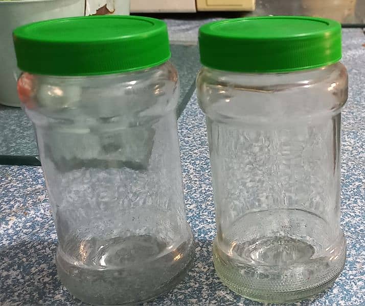 Glass Bottles/ Jars with lid. 2