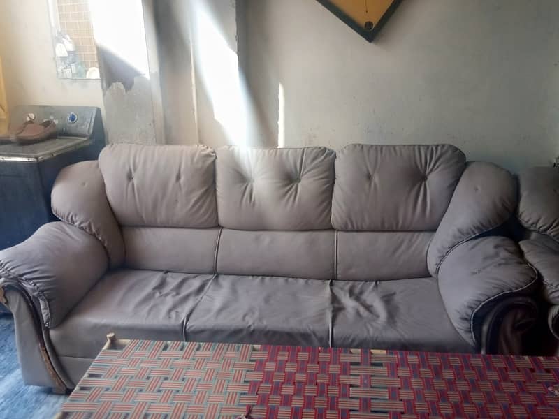 Off white color sofas 5 seater location risalpur gulbahar colony 1