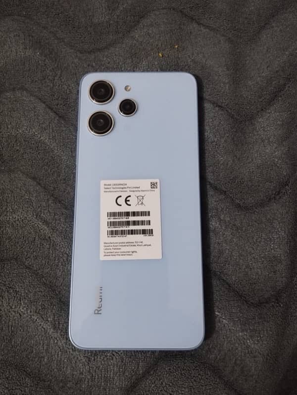 redmi 12 sky blue colour 8Gb RAM,256ROM slightly used with box 3