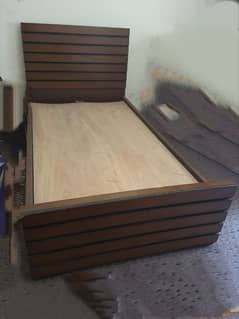 Single wooden bed