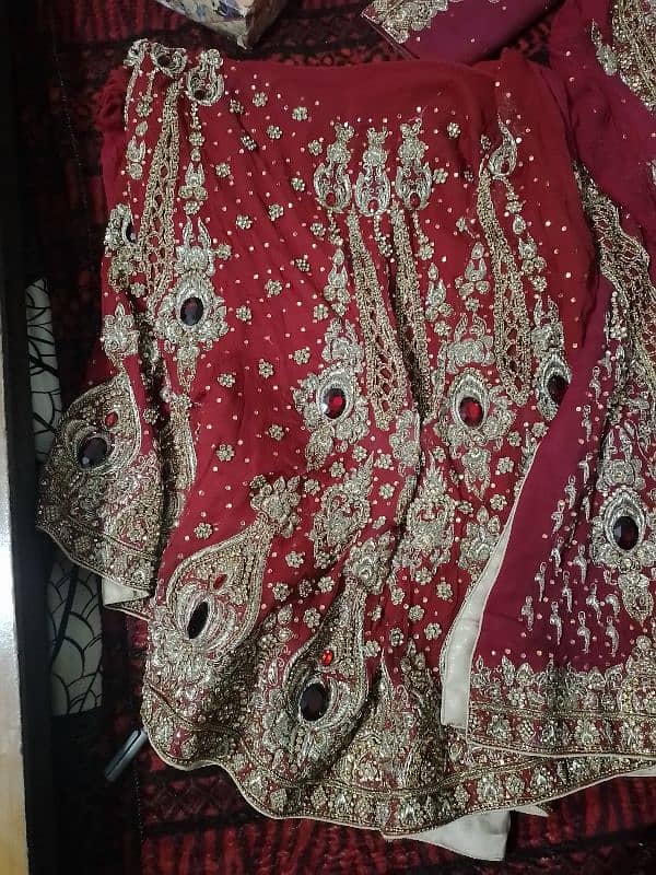 Red beautiful bridal lehenga with jewelry 4