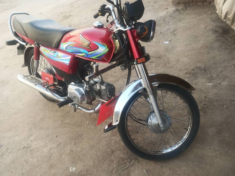 Honda CD 70 2024 4