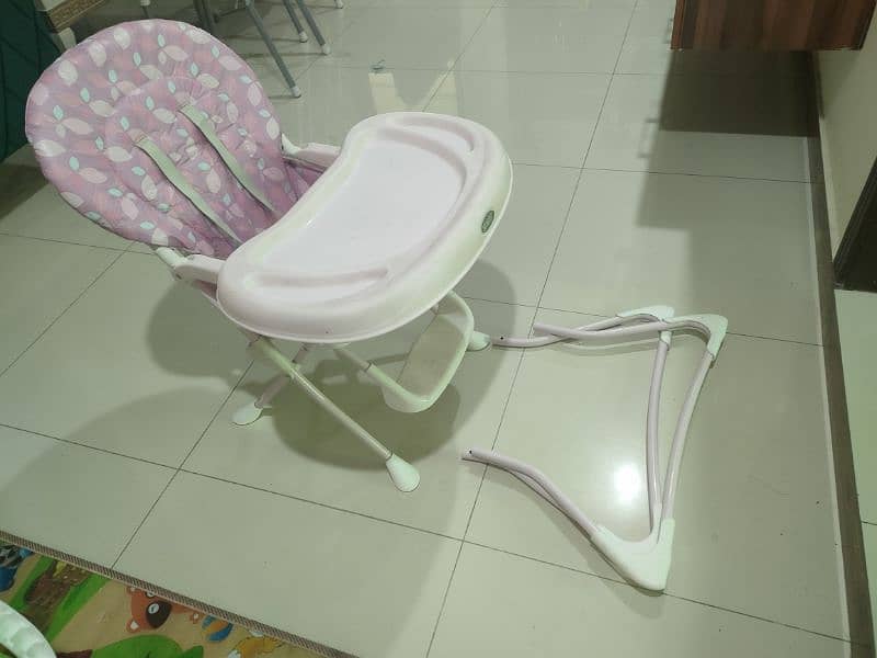 pink high chair 0