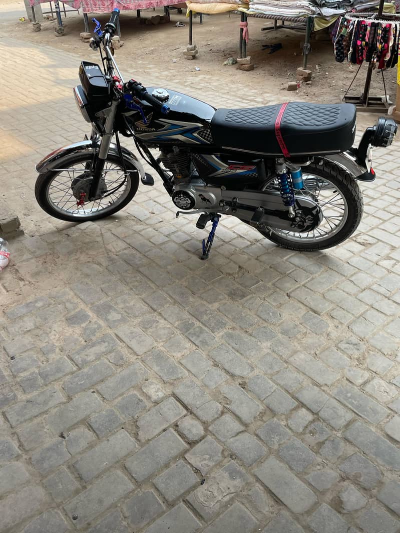 Honda 125 22modle achi condition ha 5