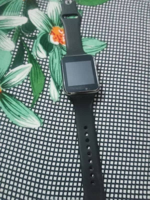 Touch Smart Watch You Can Use Sim SD Car Camera Photos etc. 1