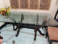 glass dinning table with 6 wooden chairs