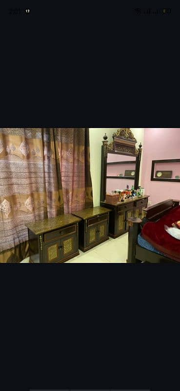 wooden double bed with side tables and dressing table and a mattress. 6