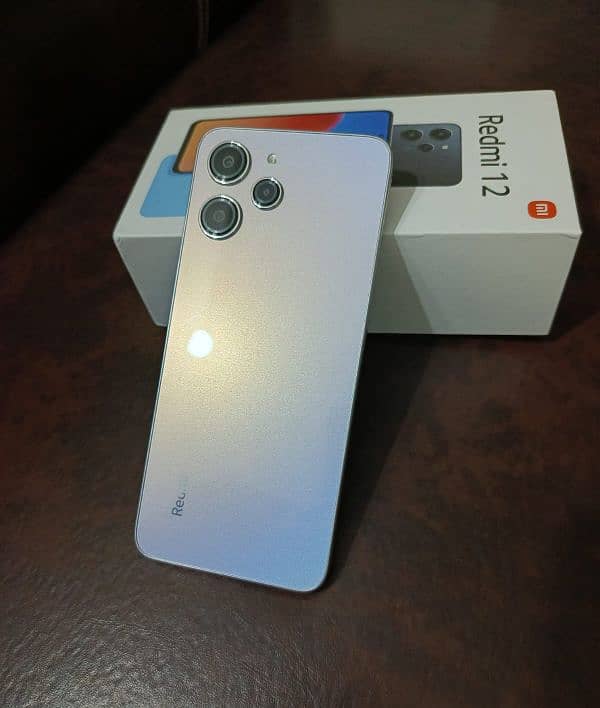 Redmi 12 brand new condition with full warranty 2